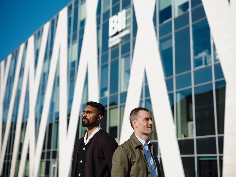 Adarsh Raj and Jörg Vogel outside the BioInnovation Institute